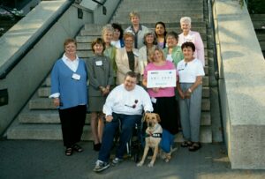 Delegates at The Arthritis Society event, posing on the stairs, 2001.